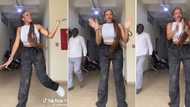 Pretty girl in tight crop top flees as lecturer catches her dancing in hallway, video trends