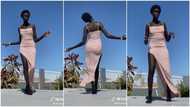Very tall lady with smooth black skin dances in viral video, height wows many people