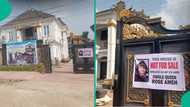 Man mounts big banner in front of house warning people about his ex-wife, celebrates winning her