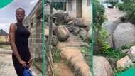 Lady shows land inheritance father left for her, it has many rocks for quarry company