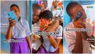 Secondary school students with iPhone 13 pro, X, and XR show them off in class, Nigerians react to their video