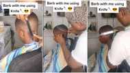 "Do you barb with cutlass?" Nigerian barber goes viral after using kitchen knive to Ccut hair, video emerges