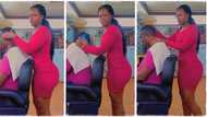 "Where is your salon, please?" Female barber with good shape gives massage to her customer, video goes viral