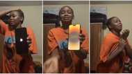 "I can't calm down": 'Garri' lady Davido gave N2m sheds tears in video as someone gifts her iPhone 14 Pro Max