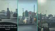 "People wey dey craze": 2 men stand in middle of road to destroy each other's cars, video trends