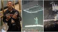 Wizkid suspended in the air, surrounded by candles as he makes spectacular entrance at O2 concert in London