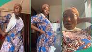 Nigerian lady enters bank pretending to be pregnant, uses fake baby bump to get quick attention