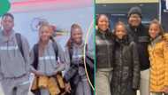 Nigerian mum and 4 kids in marching outfits reunite with her husband abroad after 2 years