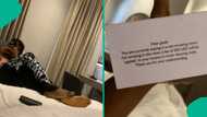Man who checked into Lagos hotel displays warning note he found in his room: "Wahala"