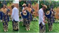 Bride groom in native attire dance Buga by Kizz Daniel, hubby moves around wife in style, video goes viral