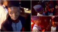 Video of Wizkid and 1st son Bolu’s interaction at his mum’s burial causes stir: “Like strangers”