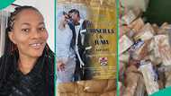 JP 2025: Lady displays loaves of bread shared as souvenirs at Priscilla Ojo's wedding to Juma Jux