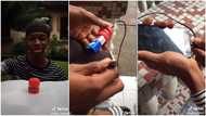 2 Nigerian boys use bottle covers to make power bank, explain how it can charge phone in video
