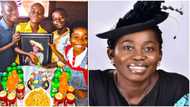 Late Osinachi’s son hugs her photo as he marks 1st birthday without her, singer’s twin sister vows to always be there
