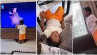 Ifeanyi scatters Davido's tastefully furnished living room, stands on N68m TV as he watches cartoon