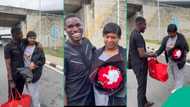 Joyful reunion of Nigerian couple as husband welcomes wife with flowers and deep affection