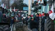 Fuming French farmers pile pressure on Paris