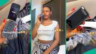 Nigerian lady gets Nokia 2720 flip phone with strong battery and celebrates