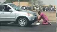 Video of man spotted praying on busy Abuja road surfaces