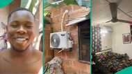 Nigerian man living in uncompleted building furnishes his room with AC, displays fine interior