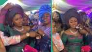 Bride's sister prevents lady from spraying money on her at wedding, video gets Nigerians talking