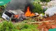 Five die instantly, including two children, after bus crashes and catches fire