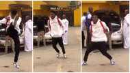 Young man shows off hot leg dance moves on street, makes mechanic and rev. father lose focus in video