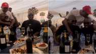 I'm the last of 3 boys: Obi Cubana shows off blood brothers as the eldest kisses his head at village party