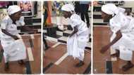 Grandmum in wrapper takes the floor in church, shocks people with energetic dance, moves legs like young lady