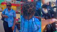 Nigerian lady flaunts rubber hair she made for Christmas as she manages her money, people gush