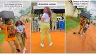 Sweet moment man stormed NYSC camp as his wife leaves, carries her bag on his head in cute video