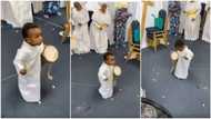 He's serving God: Kid in white garment beats drum during praise & worship session, video stirs reactions