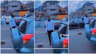 "Must you hey baby him?" Nigerian lady sees her man controlling traffic on Sunday, videos him