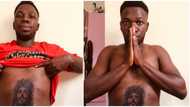 Reactions as young man tattoos Jesus Christ on his stomach, shares photos