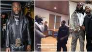 "See as he dey do like Portable": Burna Boy loses cool as he meets Usher, almost rips his chain apart in video