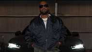 Kanye West temporarily suspended from Twitter, urinates on his Grammy award