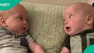 Twin babies share first smiles and eye contact, mother wishes their friendship will deepen