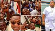 Be like say I drop album: Huge crowd of young men welcome Cubana Chiefpriest as he arrives Lagos airport