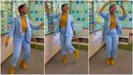 "She loves her job:" Pretty female teacher in trousers dances to amapiano in class, teaches kids