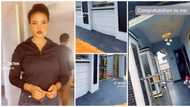 "I love this": Nigerian lady builds a fine house, paints the floor outside the gate black, cute video trends