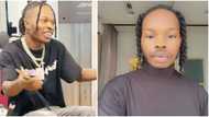 Old video of Naira Marley and his son showing off their dance skills causes a stir