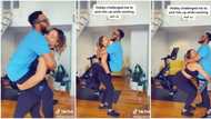 She shocked him: Nigerian man screams as his pretty Oyinbo wife with nice physique lifts him up in cute video