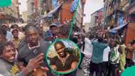 VeryDarkMan storms Lagos island market, crowd fights over him in viral video: “VDM for president”