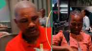 Parents receive new phones from their daughter at restaurant and their reactions are priceless