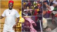 Obi Cubana's mum's burial: Residents of Oba fight over leftover beef, kids scoop hot pepper soup with hands
