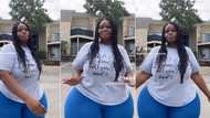 "Lord have mercy": Curvy African woman with thick legs dances on the road in viral video, netizens praise her