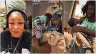 "Please be careful o": Nigerian lady babysits beautiful "mad" woman's newborn child, shares touching video