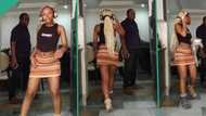 Lady places camera in dad's parlour, dances in mini skirt, father walks in, "stops" her