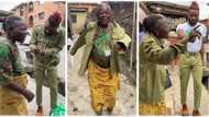 "This is my turn": Nigerian mother wears her son's NYSC khaki, dances with joy to welcome him from service