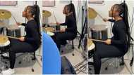 "Beauty and talent": Cute lady displays exceptional drumming skills in church, video goes viral